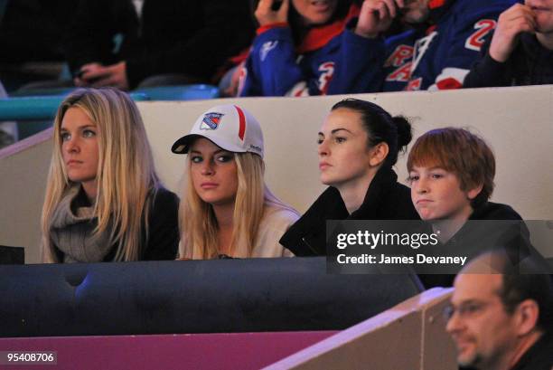 Lindsay Lohan, Ali Lohan and Dakota Lohan attend the New York Islanders vs New York Rangers game at Madison Square Garden on December 26, 2009 in New...