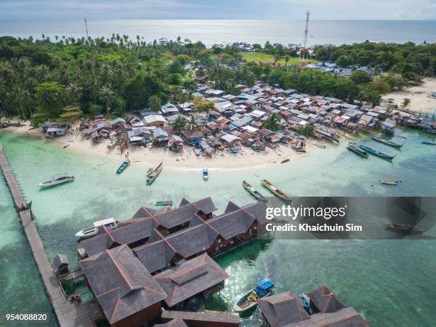 fishing village from sky - mabul island stock pictures, royalty-free photos & images