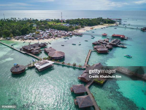 fishing village from sky - mabul island stock pictures, royalty-free photos & images