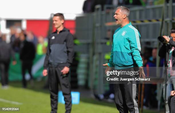 Manager Christian Wueck of Germany gives instructions during the international friendly match between U15 Germany and U15 Netherlands on May 3, 2018...