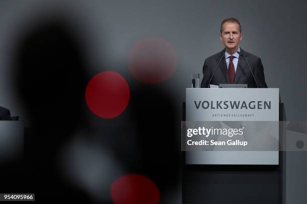 Herbert Diess, the newly-appointed chairman of German car manufacturer Volkswagen AG, sepaks at the company's annual general shareholders' meeting on...