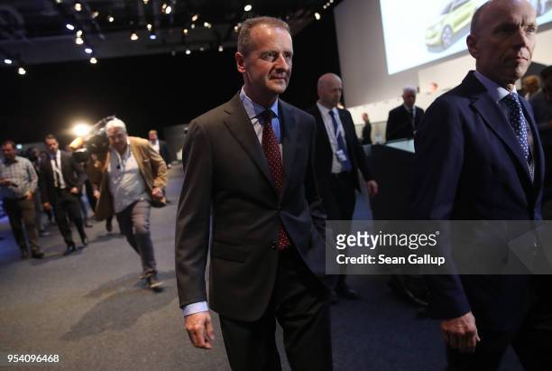 Herbert Diess , the newly-appointed chairman of German car manufacturer Volkswagen AG, arrives to speak at the company's annual general shareholders'...