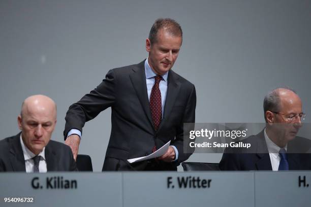 Herbert Diess , the newly-appointed chairman of German car manufacturer Volkswagen AG, attends the company's annual general shareholders' meeting on...