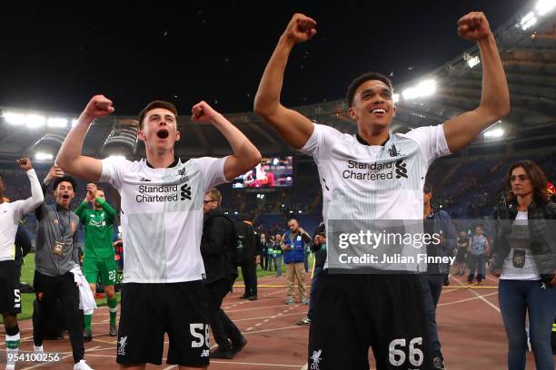 Trent Alexander-Arnold and Ben Woodburn of Liverpool celebrate at full time during the UEFA Champions League Semi Final Second Leg match between A.S....