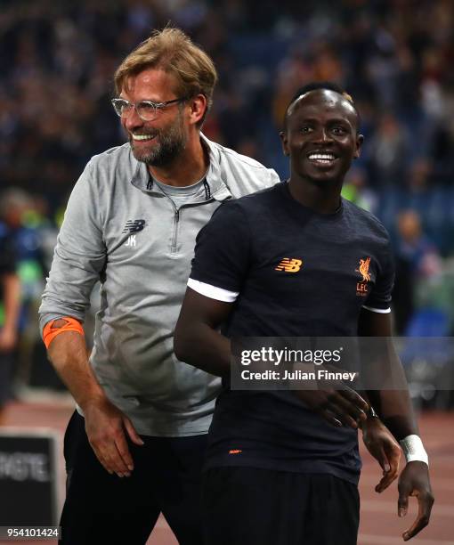 Manager Jurgen Klopp celebrates with Sadio Mane of Liverpool at full time during the UEFA Champions League Semi Final Second Leg match between A.S....
