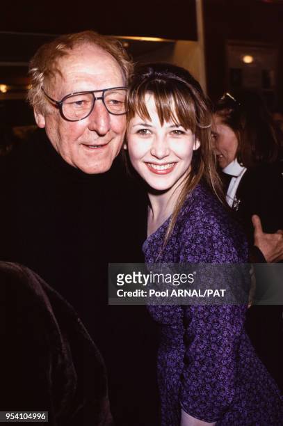 Georges Wilson et Sophie Marceau lors d'une soirée en février 1991 à Paris, France.