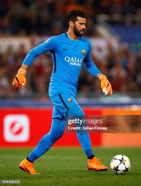 Goalkeeper of Roma Alisson Becker brings the ball out during the UEFA Champions League Semi Final Second Leg match between A.S. Roma and Liverpool at...