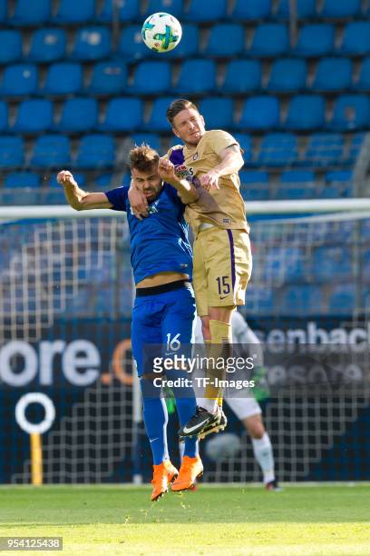 Lukas Hinterseer of Bochum and Dennis Kempe of Erzgebirge Aue controls the ball during the Second Bundesliga match between VfL Bochum 1848 and FC...