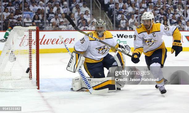 Roman Josi of the Nashville Predators chases a loose puck during action against the Winnipeg Jets in Game Three of the Western Conference Second...
