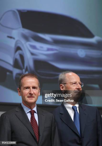 Herbert Diess , the newly-appointed chairman of German car manufacturer Volkswagen AG, and VW board member Hans Dieter Poetsch arrive to speak at the...