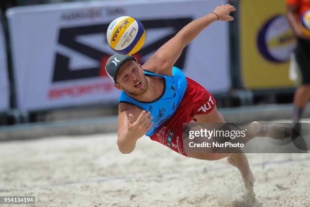 Felix Friedl of Austria receives the ball during the Qualification Tournament of the Federation Internationale De Volleyball Beach Volleyball World...