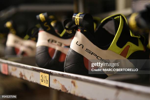 Picture taken on May 3, 2018 shows climbing shoes of La Sportiva, brand leader of Climbing shoes, in La Sportiva Factory in Ziano di Fiemme, Northern...