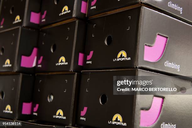 Picture taken on April 19, 2018 shows boxes of climbing shoes of La Sportiva, brand leader of Climbing shoes, in La Sportiva Factory in Ziano di...