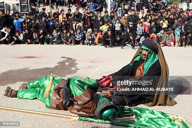 Shiite Muslims living in the Sadr City neighborhood of Baghdad watch a procession and play depicting the battle of Karbala where Imam Hussein,...
