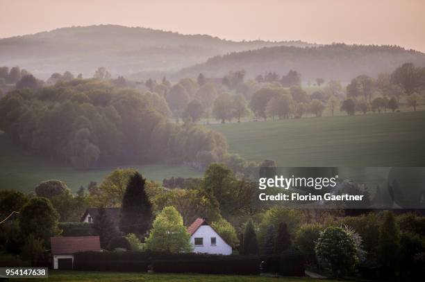 View to a small village in the evening light on April 29, 2018 in Kunnersdorf, Germany.