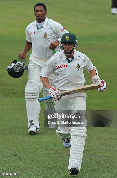 Dale Steyn and Makhaya Ntini of South Africa sprint off after their last wicket stand of 58 runs during day 2 of the 2nd test match between South...