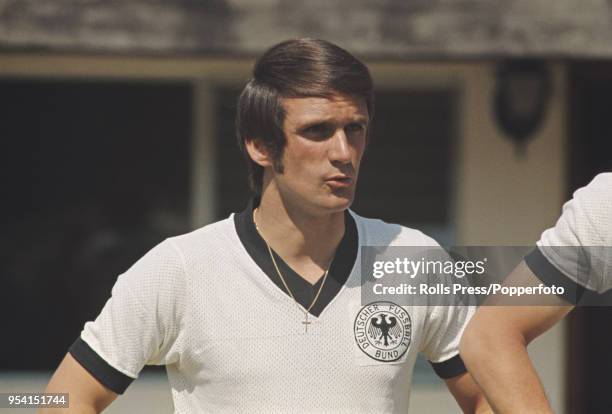 West German international footballer Wolfgang Overath of FC Koln pictured in the garden of the Hotel Balneario in Comanjilla, Mexico prior to...