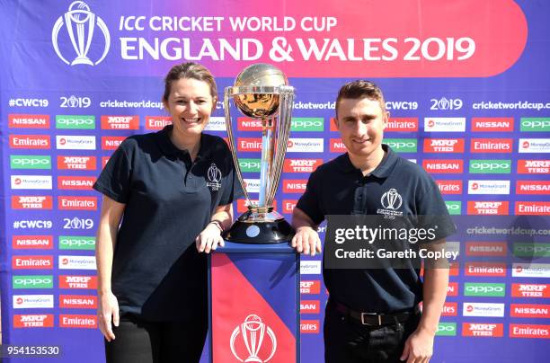 Former England captains James Taylor and Charlotte Edwards pose with the Cricket World Cup during the Cricket World Cup 2019 Volunteers Launch event...