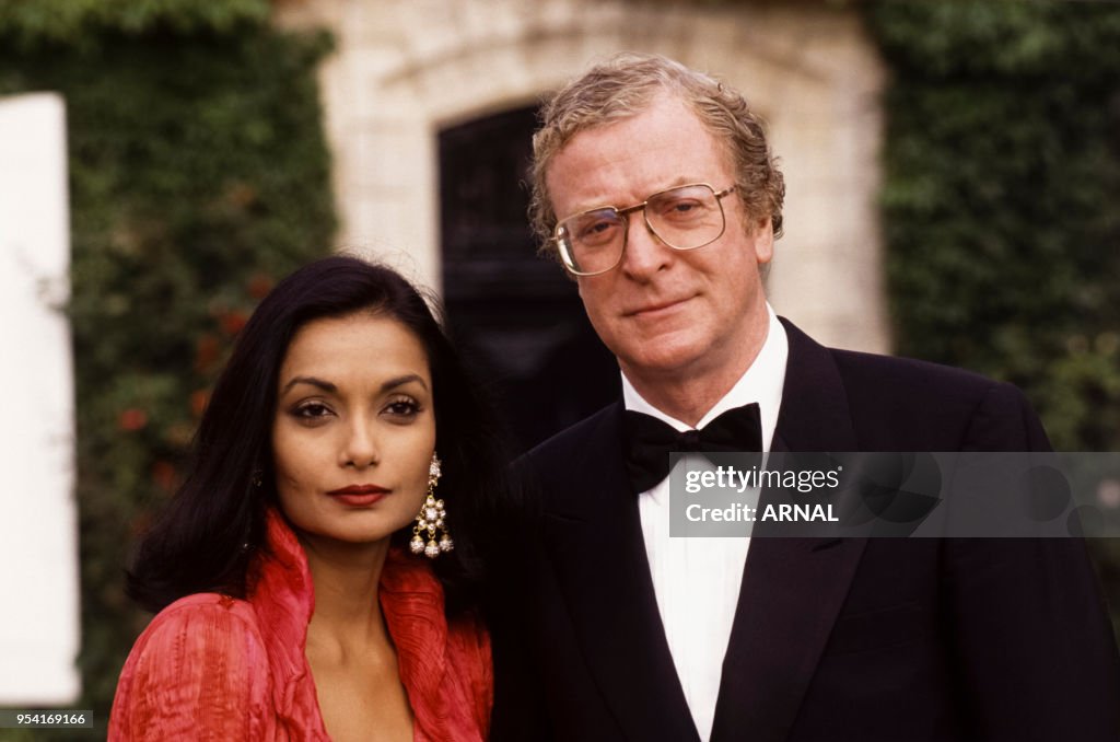Michael Caine et sa femme Shakira lors de la Fête de la Fleur à... News