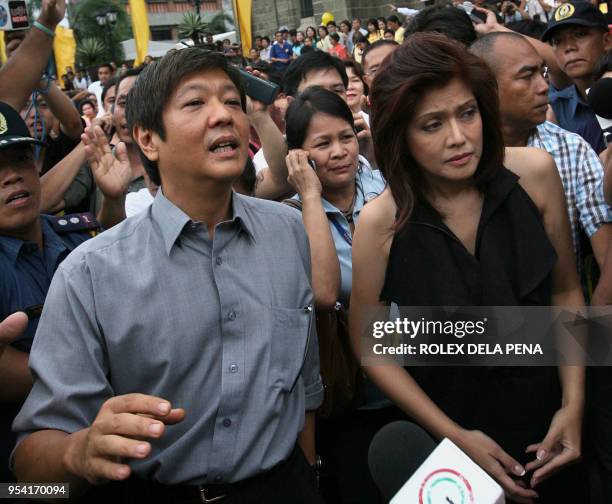 Ferdinand 'Bong-Bong' Marcos Jr. And Imee Marcos , the children of the late Philippine president Ferdinand Marcos, leave the Manila Cathedral after...