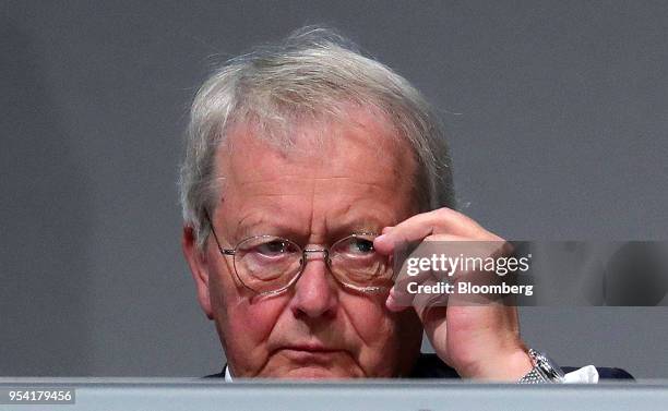 Wolfgang Porsche, chairman of Porsche SE, adjusts his spectacles during the Volkwagen AG annual general meeting in Berlin, Germany, on Thursday, May...