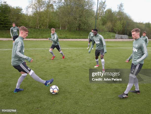Ethan Galbraith, Dion McGhee, Aliou Traore and George Tanner at Aon Training Complex on May 2, 2018 in Manchester, England.