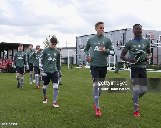 Dylan Levitt, Millen Baars and Di'Shon Bernard of Manchester United U18s in action during an U18s training session at Aon Training Complex on May 2,...