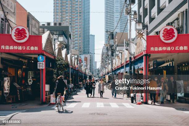 the view of tsukishima monja street, tsukishima, tokyo - monja 個照片及圖片檔