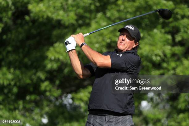 Phil Mickelson plays his tee shot on the 15th hole during the first round of the 2018 Wells Fargo Championship at Quail Hollow Club on May 3, 2018 in...