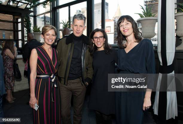 Cindi Leive, Stefano Tonchi, Jodi Kantor and Megan Twohey attend the Brilliant Minds Initiative dinner at Gramercy Park Hotel Rooftop on May 1, 2018...