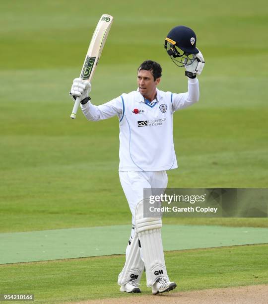 Wayne Madsen of Derbyshire celebrates reaching his century during the Specsavers County Championship Division Two match between Warwickshire and...