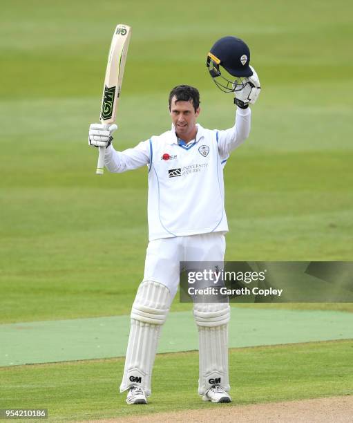 Wayne Madsen of Derbyshire celebrates reaching his century during the Specsavers County Championship Division Two match between Warwickshire and...