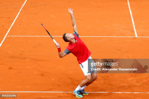 Philipp Kohlschreiber of Germany serves during his 2nd round match against Mischa Zverev on day 6 of the BMW Open by FWU at MTTC IPHITOS on May 3,...