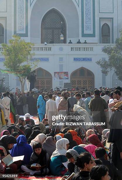 Supporters of slain former premier Benazir Bhutto gather on her second death anniversary in Garhi Khuda Bakhsh on December 27, 2009. More than 5,000...