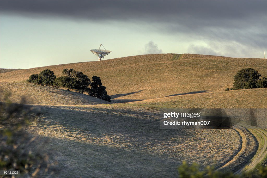 Radar dish on a hill