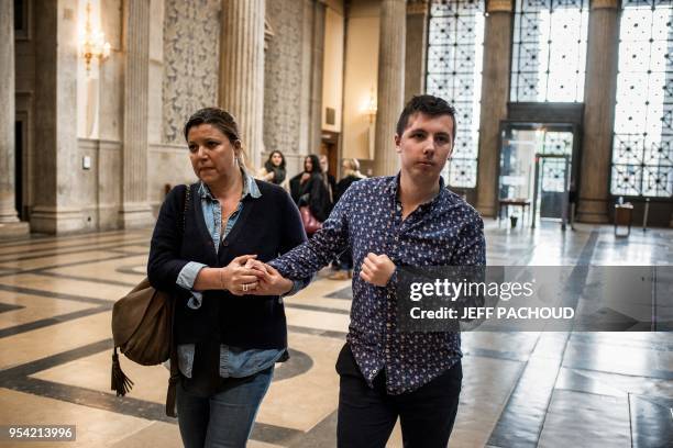 Marin arrives accompanied by a relative, on May 3, 2018 at the courthouse of Lyon, central eastern France, to attend the second day of the trial of...