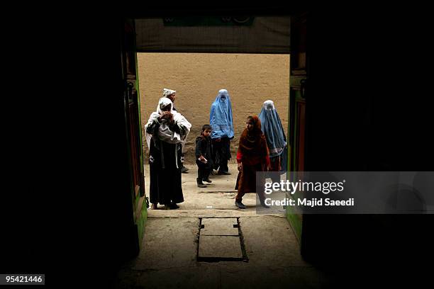 Afghan Shiite Muslim women pray during Ashura at a Shiite mosque on December 27, 2009 in Kabul, Afghanistan. Ashura is a period of mourning in...