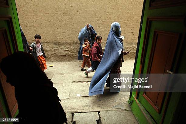 Afghan women pray during Ashura in Kabul, Afghanistan on December 27, 2009. Ashura is a 10 day period of mourning for Imam Hussein, the seven-century...