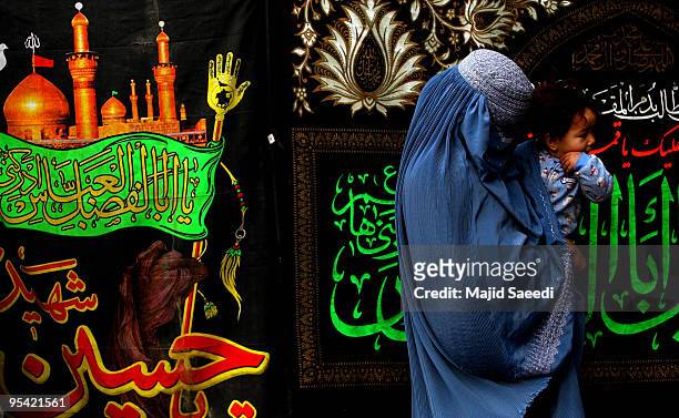 Afghan women pray during Ashura in Kabul, Afghanistan on December 27, 2009. Ashura is a 10 day period of mourning for Imam Hussein, the seven-century...