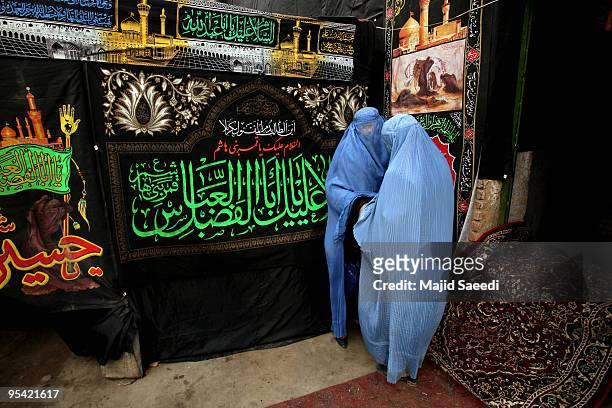 Afghan Shiite Muslim women pray during Ashura at a Shiite mosque on December 27, 2009 in Kabul, Afghanistan. Ashura is a period of mourning in...