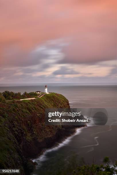 vertical view of kilauea lighthouse in sunrise, princeville, kauai - princeville stock pictures, royalty-free photos & images