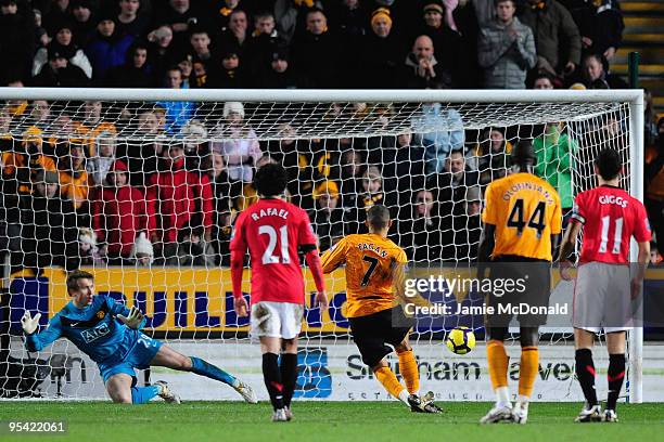 Craig Fagan of Hull City scores his team's first goal, from a penalty, past Tomasz Kuszczak of Manchester United during the Barclays Premier League...