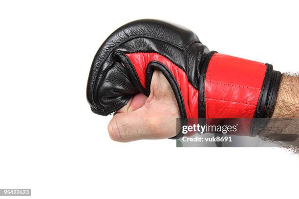 mma fighter's fist - kickboxing gloves stock pictures, royalty-free photos & images