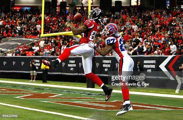 Roddy White of the Atlanta Falcons pulls in this touchdown reception against Reggie Corner of the Buffalo Bills at Georgia Dome on December 27, 2009...