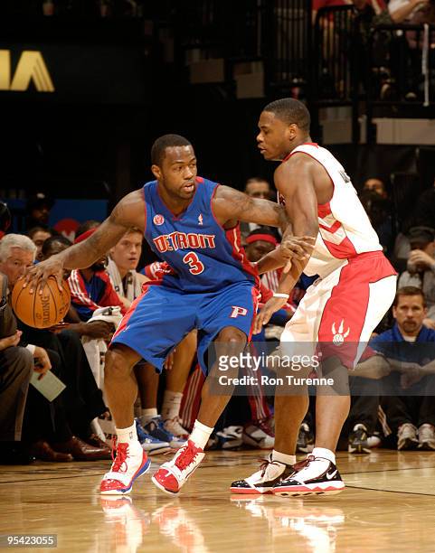 Rodney Stuckey of the Detroit Pistons tries to get around defender Marcus Banks of the Toronto Raptors during a game on December 27, 2009 at the Air...