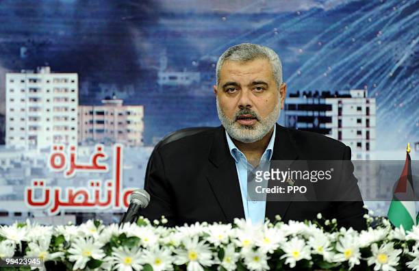 In this handout image from the Palestinian Prime Minister's Office , Hamas chief in Gaza Ismail Haniyeh speaks during a televised address from an...