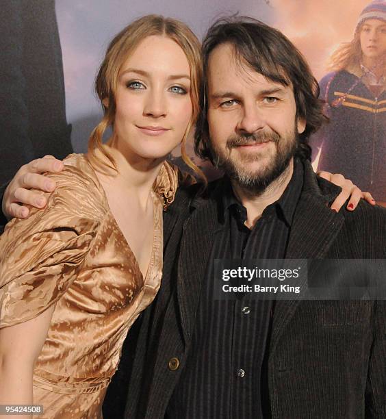 Actress Saoirse Ronan and director/producer Peter Jackson arrive at the Los Angeles Premiere "The Lovely Bones" at Grauman's Chinese Theatre on...