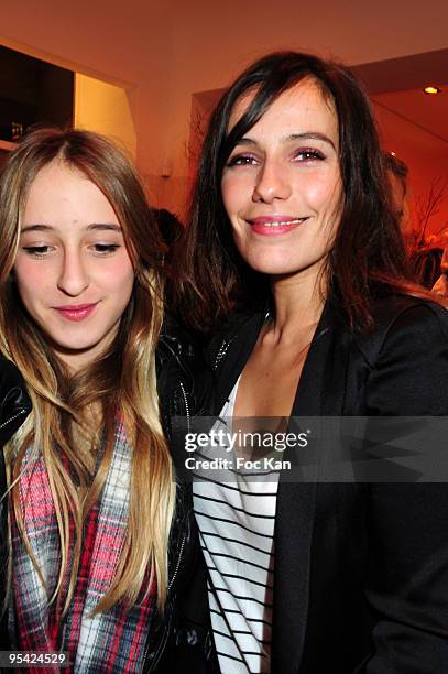 Actress Zoe Felix and her boy friend actor Benjamin RollandÔs daughter Perle attend the Comptoir des Cotonniers Opening Party at Comptoir des...