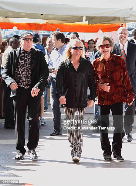 Rick Nielsen, Robin Zander and Tom Petersson attend the Miami Dolphins game at Landshark Stadium on December 27, 2009 in Miami, Florida.