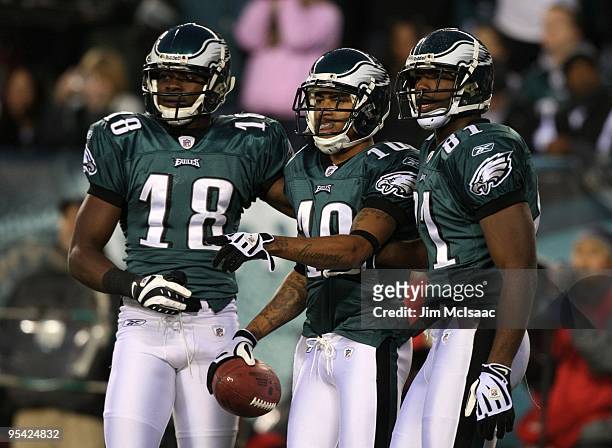 DeSean Jackson of the Philadelphia Eagles celebrates with teammates Jeremy Maclin and Jason Avant after scoring a touchdown in the first quarter...